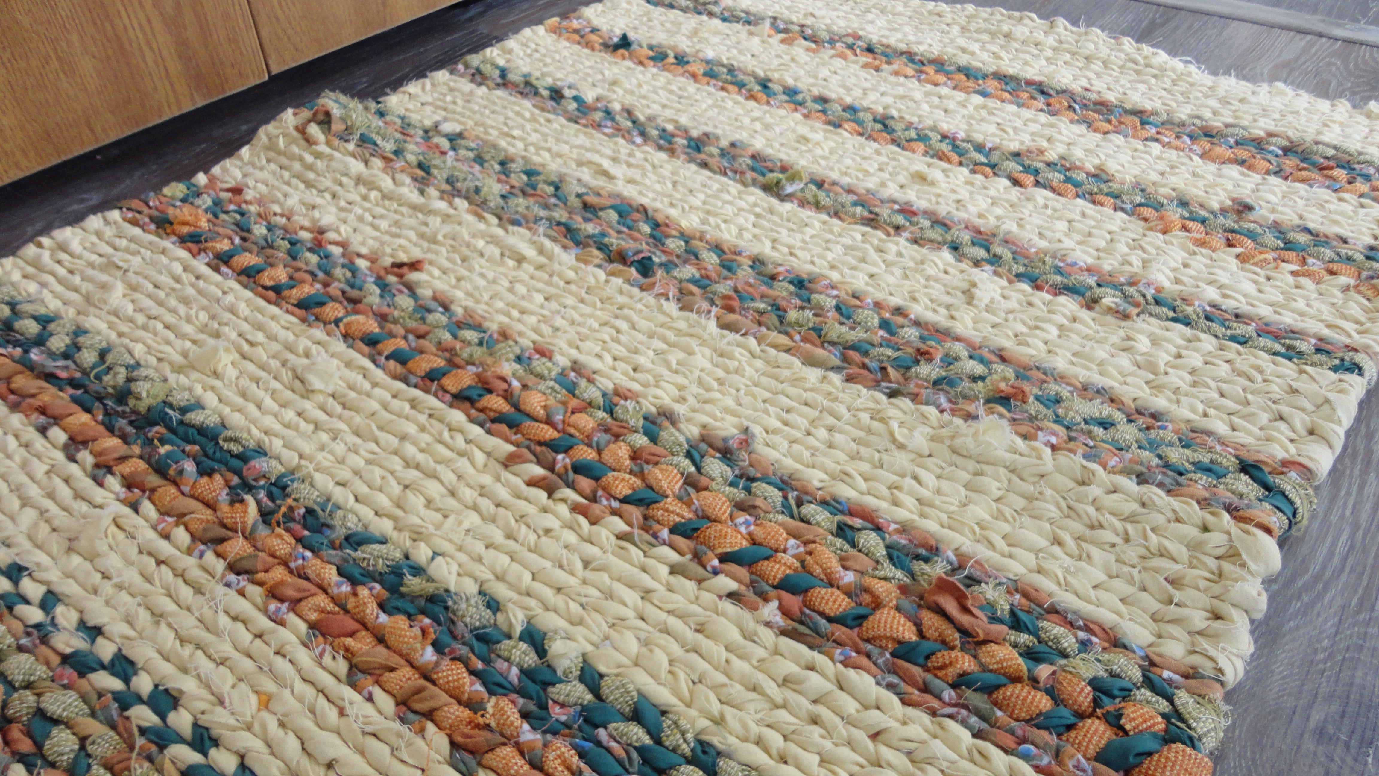 Cheery Southwest yellow, orange, dark teal, green handwoven twined rag rug woven carpet