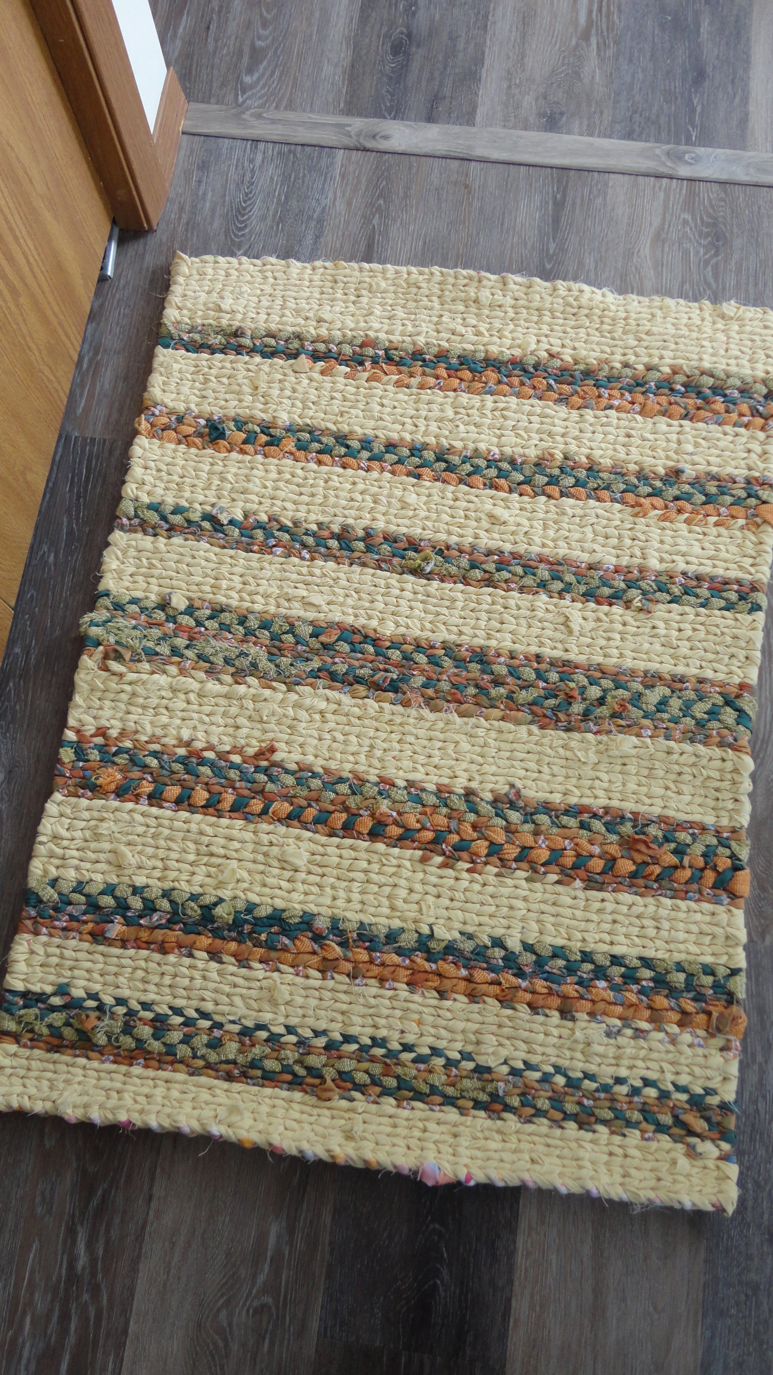 Cheery Southwest yellow, orange, dark teal, green handwoven twined rag rug woven carpet