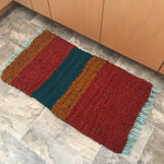 orange, yellow, teal blue peg loom fabric rag rug woven carpet