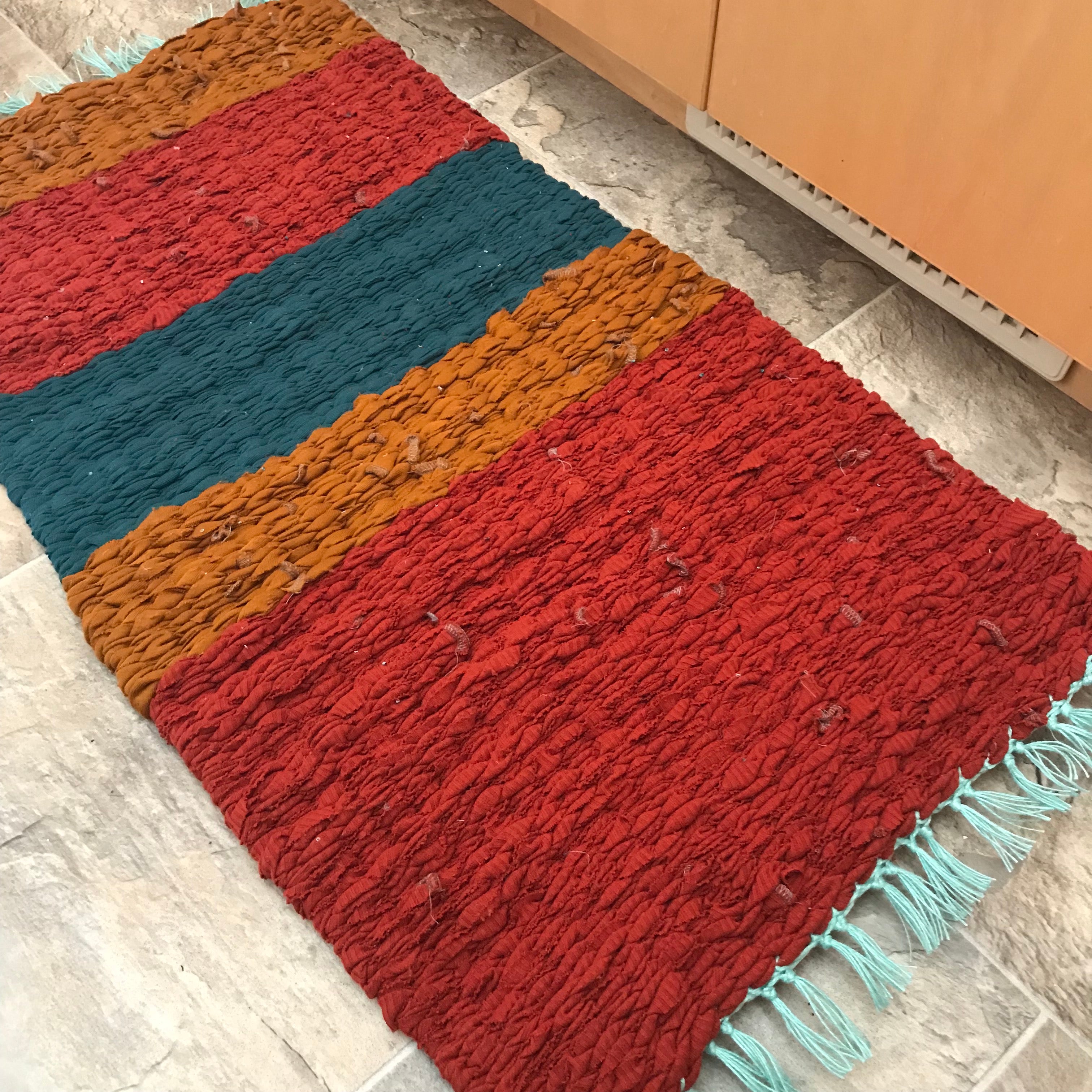 orange, yellow, teal blue peg loom fabric rag rug woven carpet
